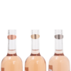 3 anneaux anti-gouttes sur des bouteilles de vin