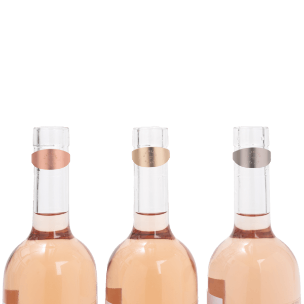 3 anneaux anti-gouttes sur des bouteilles de vin