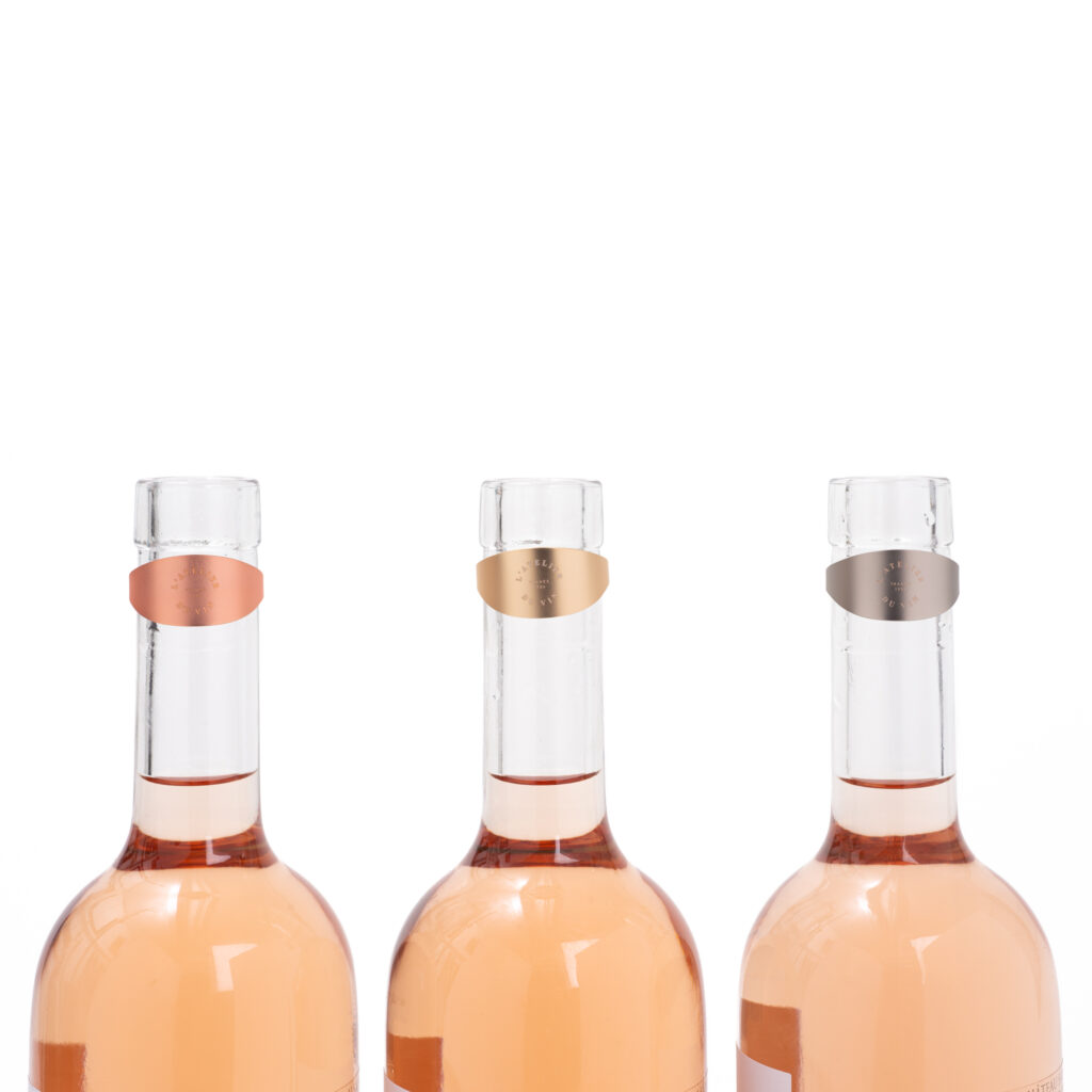 3 anneaux anti-gouttes sur des bouteilles de vin - L'Atelier du Vin