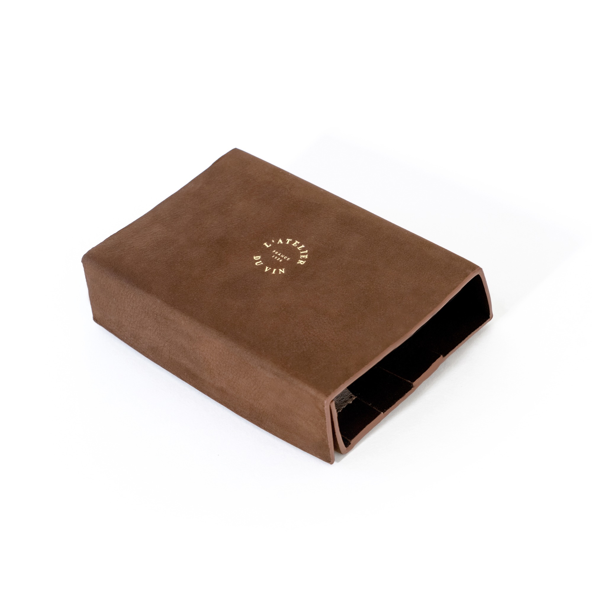 Lederbeutel mit Weinflaschenstöpseln und Weintropfenstoppern