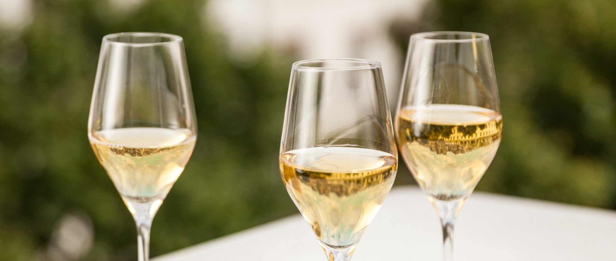 Why does one drink Champagne to celebrate?